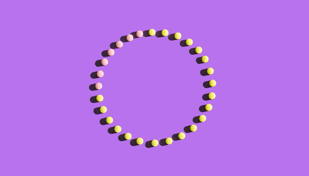 Birth control pills arranged in a circle.