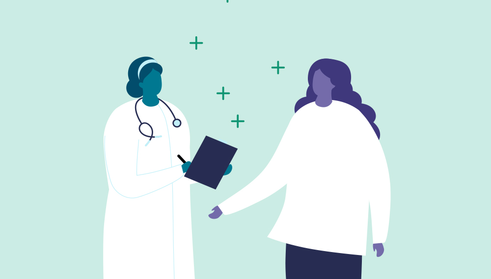 A woman talks with her doctor. 