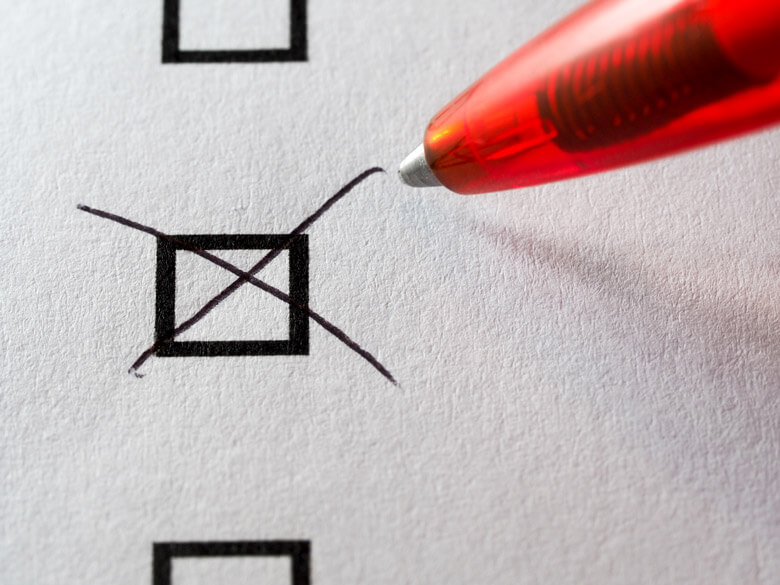 red pen marking a checkbox