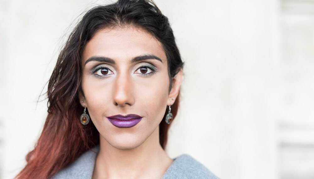 Transgender woman looking at the camera.