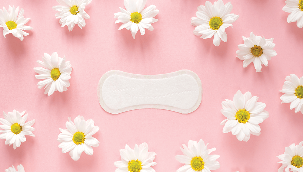 Feminine hygiene pad and flowers.