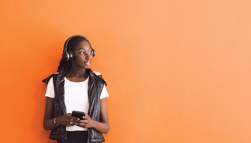 Woman wearing headphones.